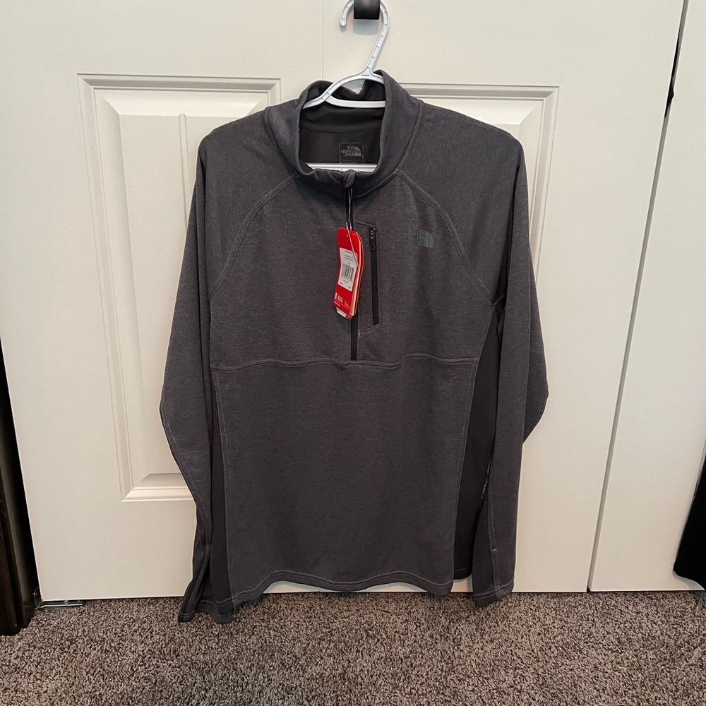 Men’s North Face size large running zip up. NWT